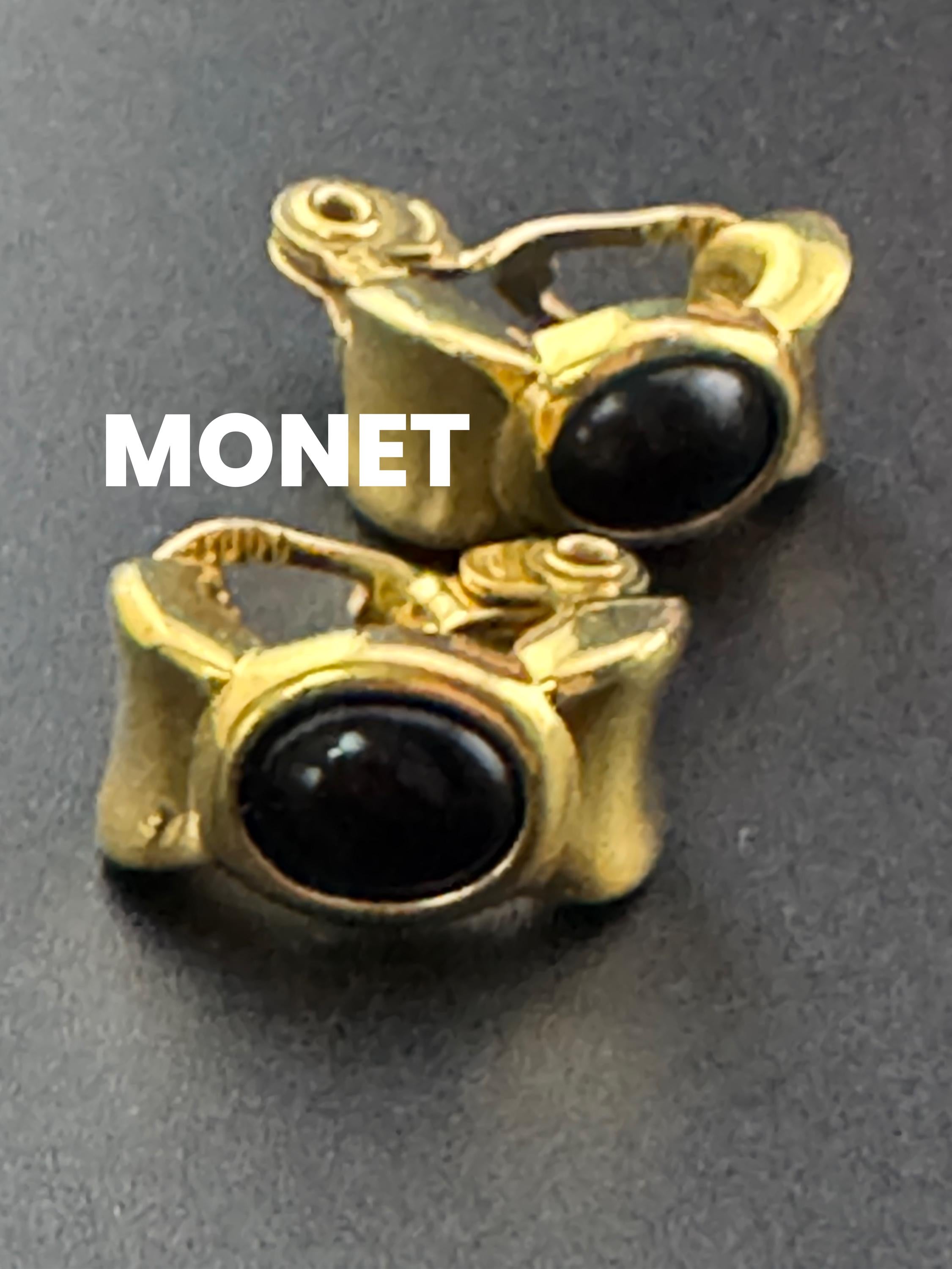 Signed MONET Gold tone black oval cabochon half hoop clip on earrings