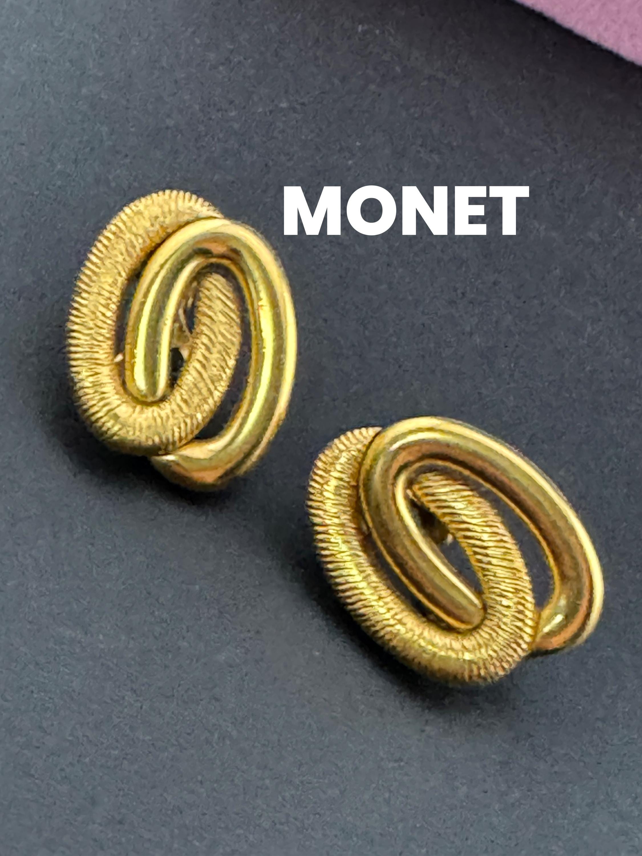 Signed MONET Gold tone textured double oval clip on earrings