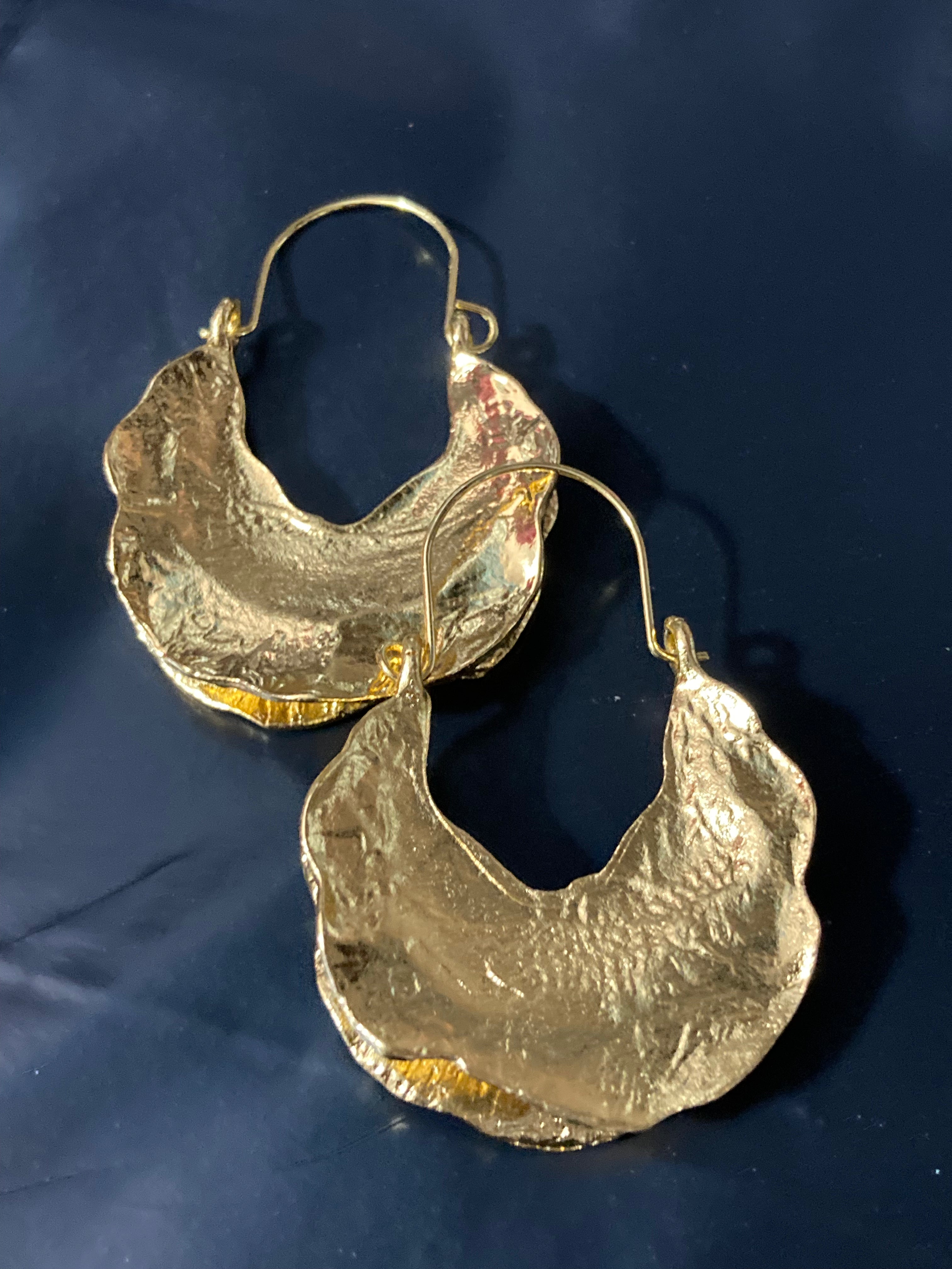 Gold Modernist beaten metal large creole hoop earrings