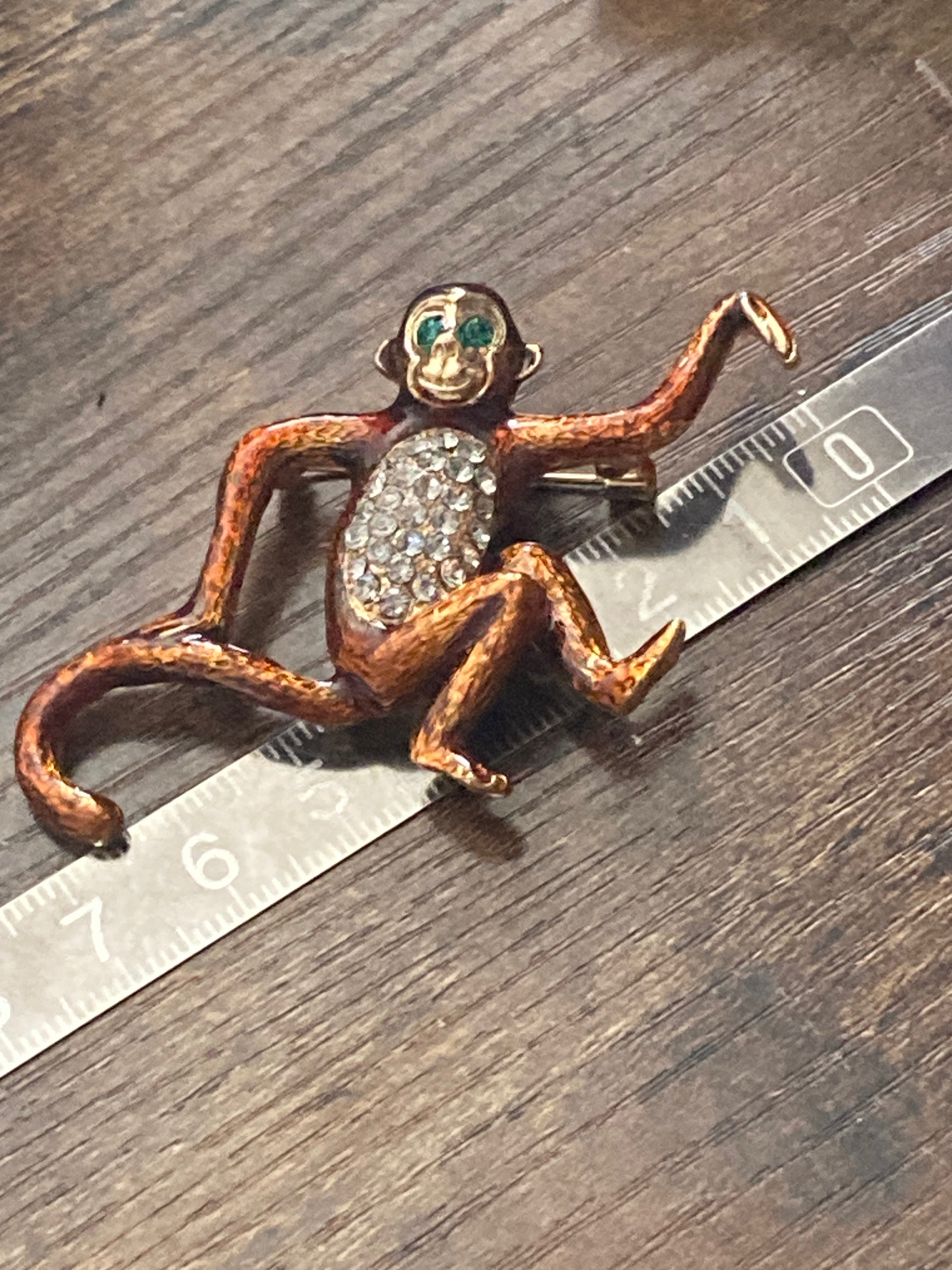 Brown enamel diamanté monkey brooch