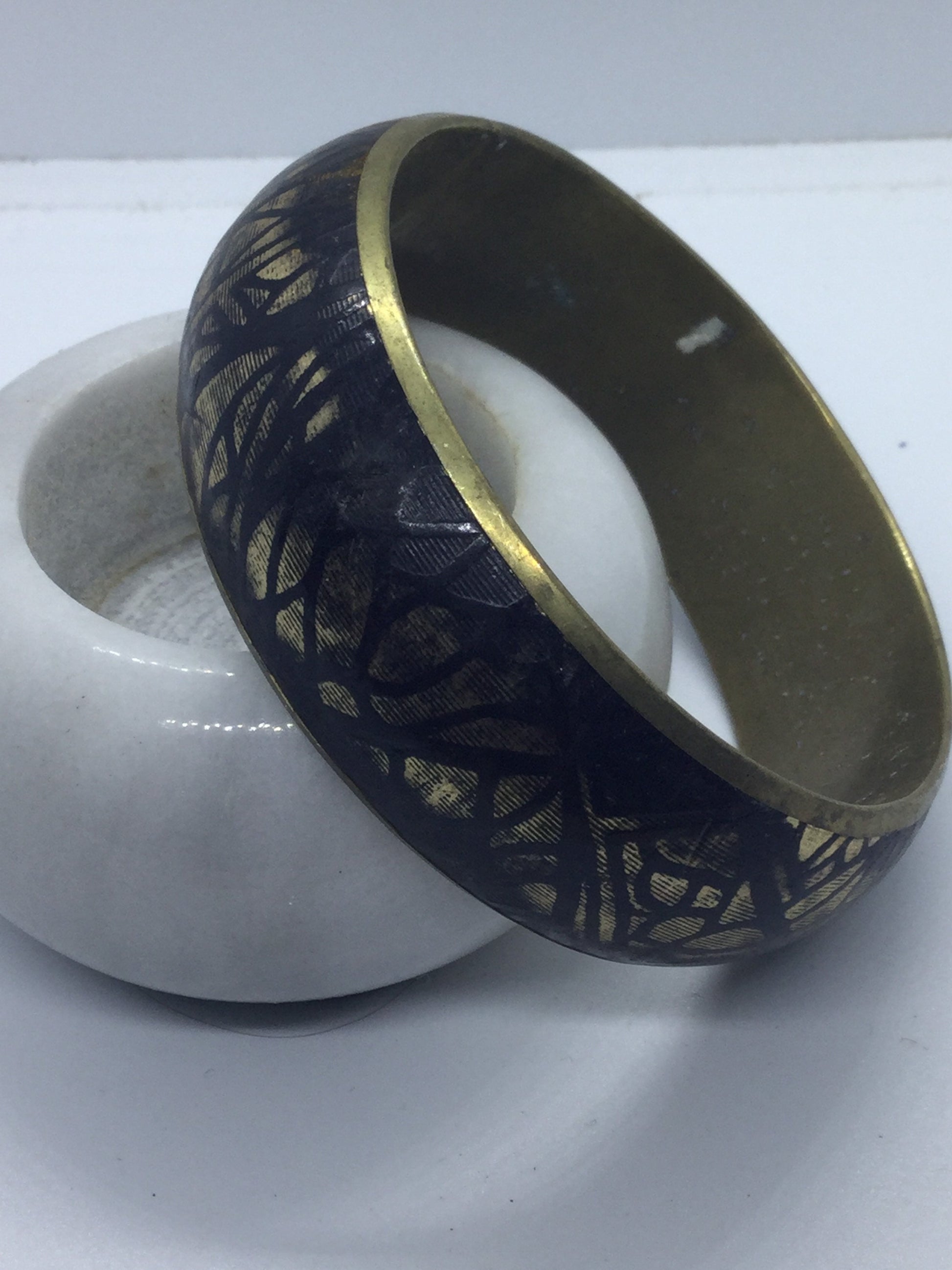 Black and gold tone brass wide cuff bangle