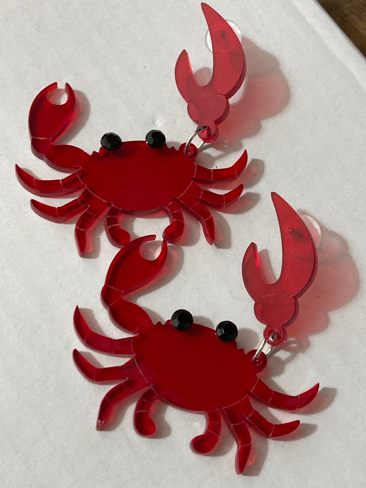 Large red acrylic crab earrings