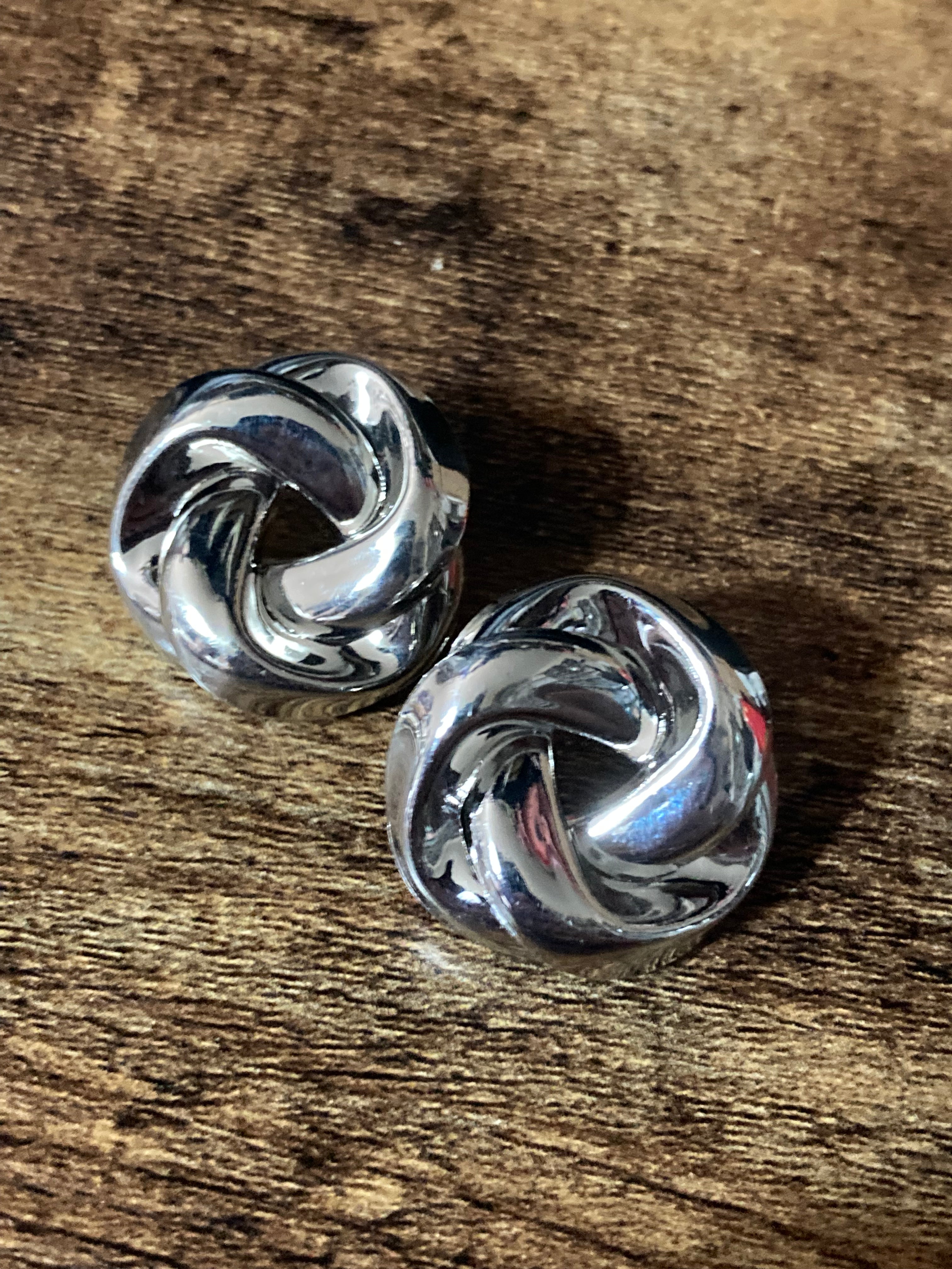 Silver embossed knot earrings