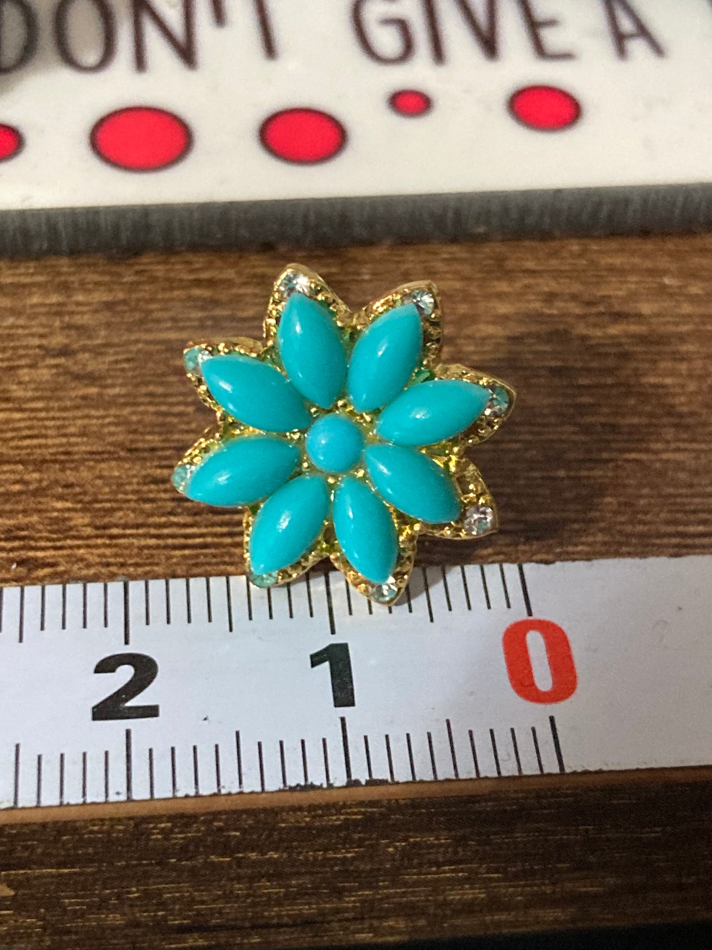 Small turquoise diamanté flower stud earrings