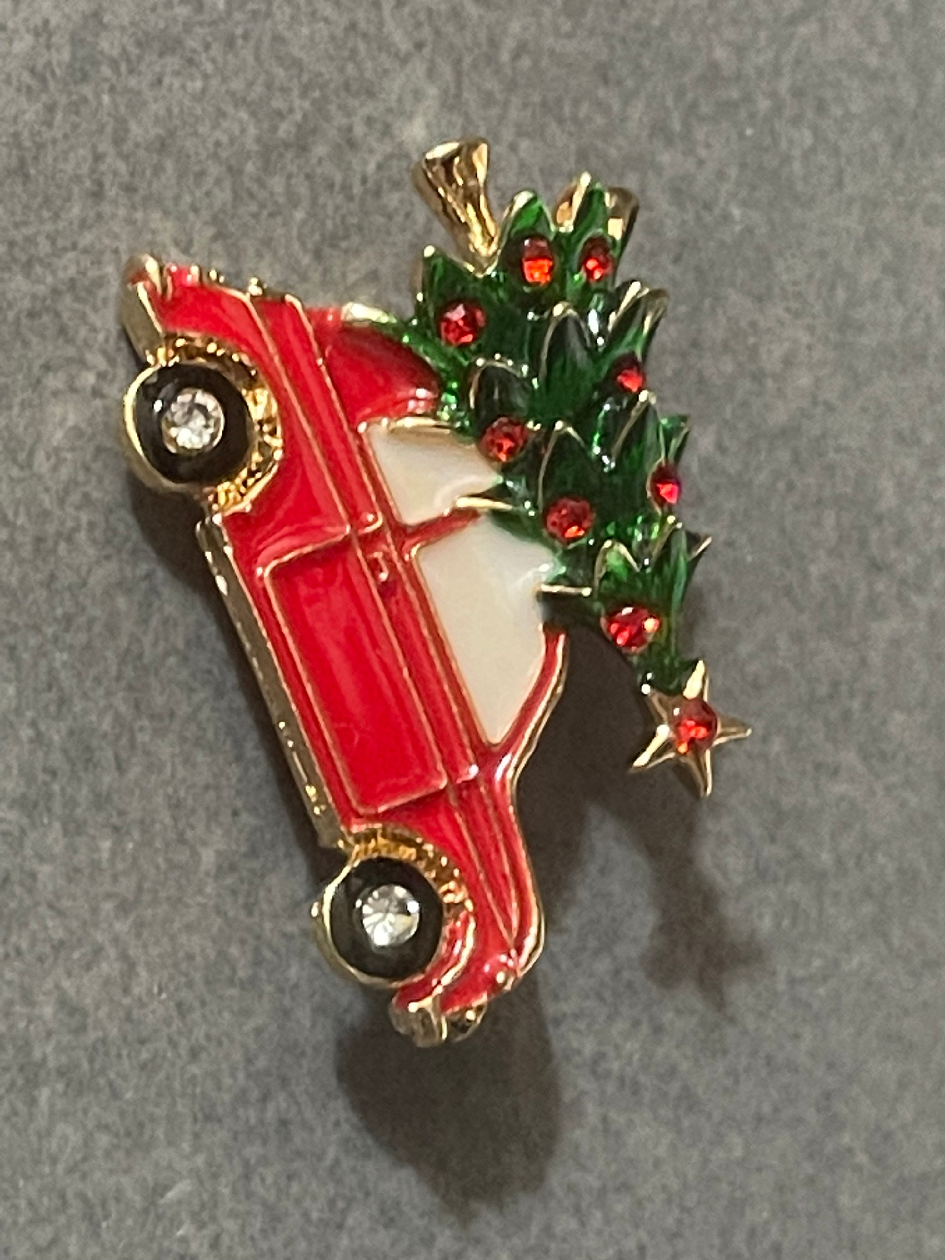 Driving home for Christmas tree and car brooch