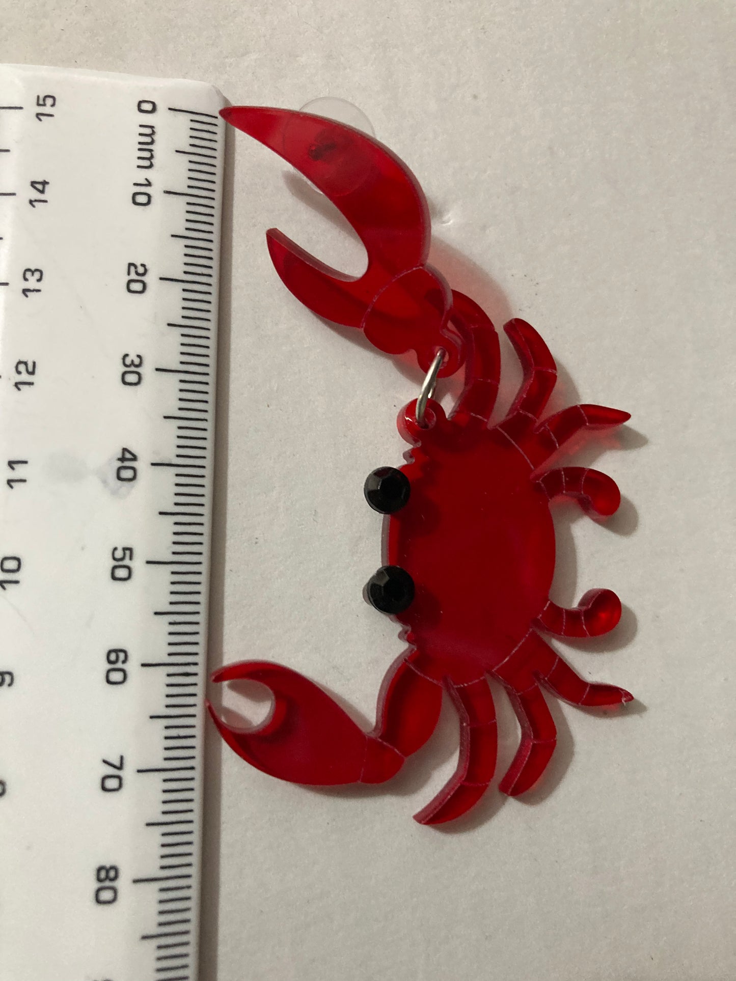 Large red acrylic crab earrings