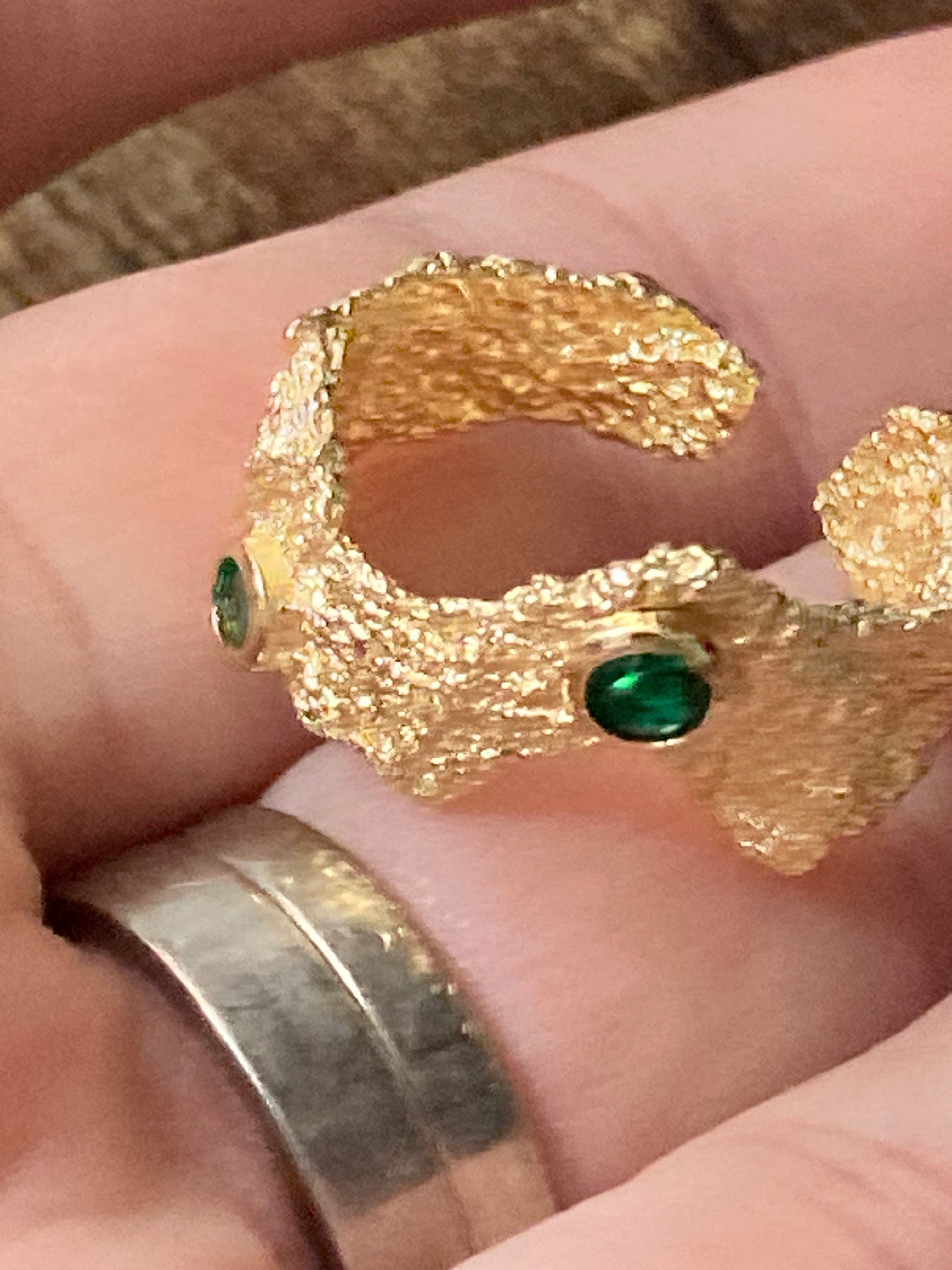 Modernist gold tone bark nugget dress ring with green stones