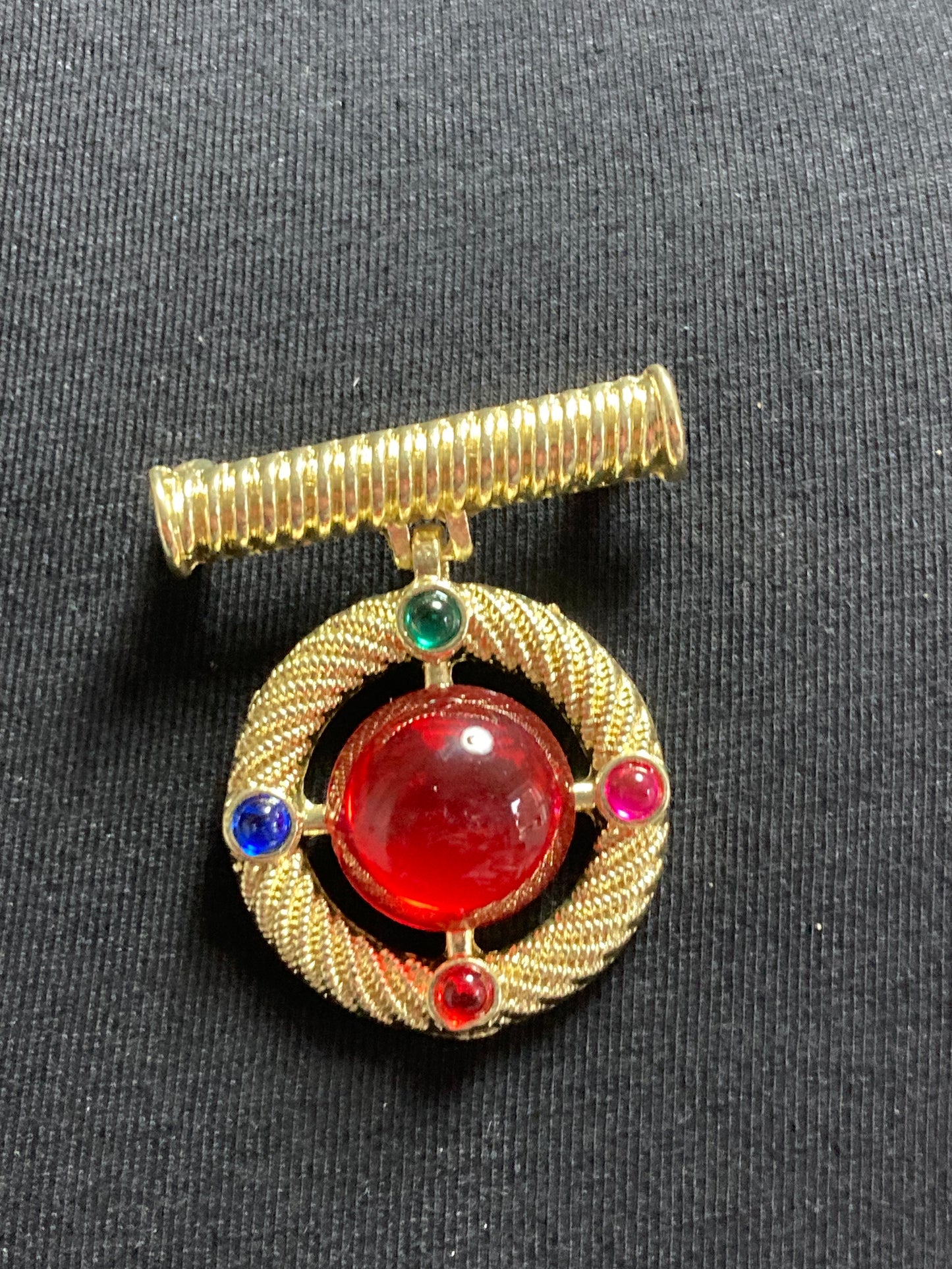 Gold medal ruby glass hanging brooch