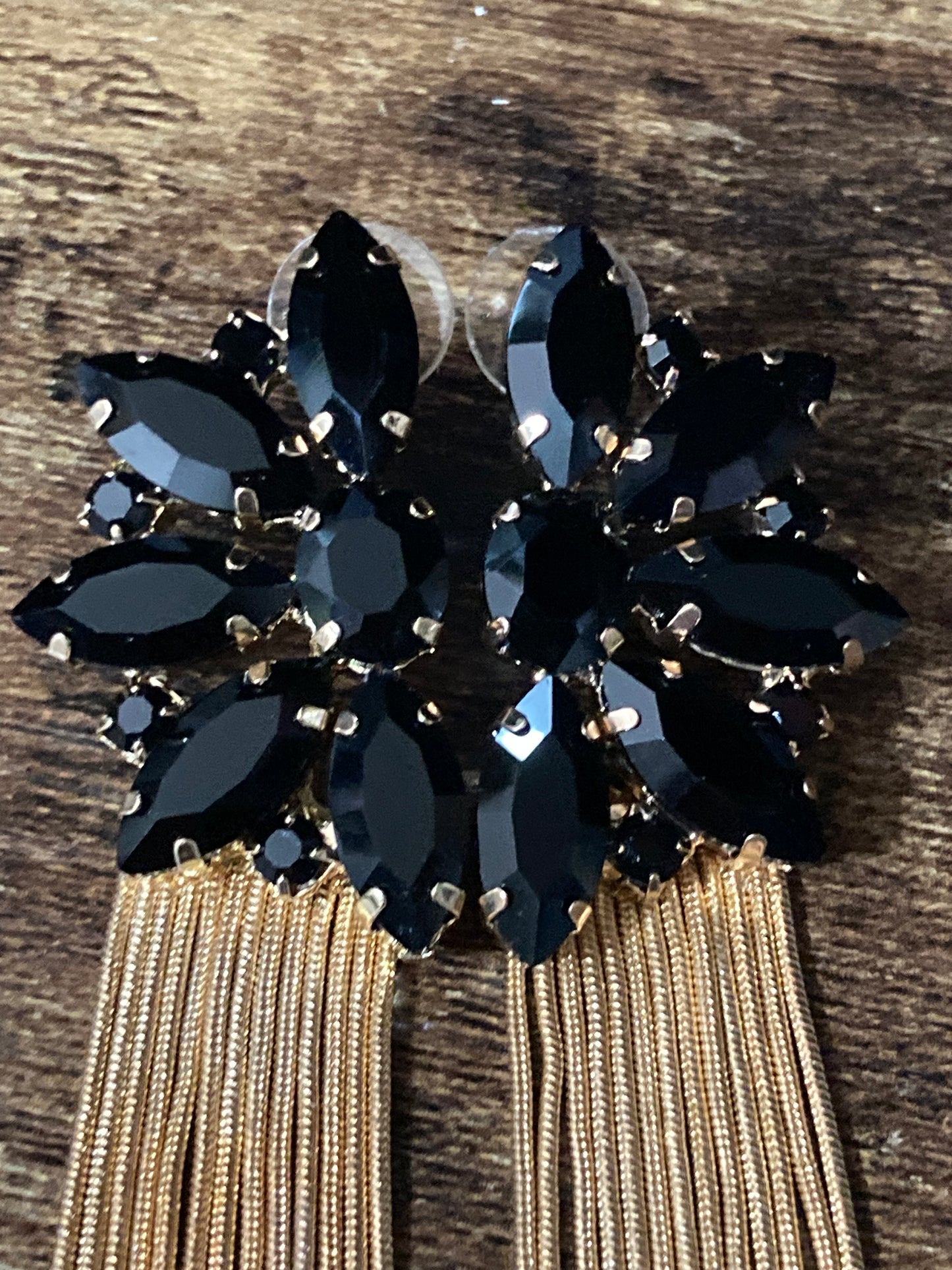 Black diamanté long gold tassel earrings