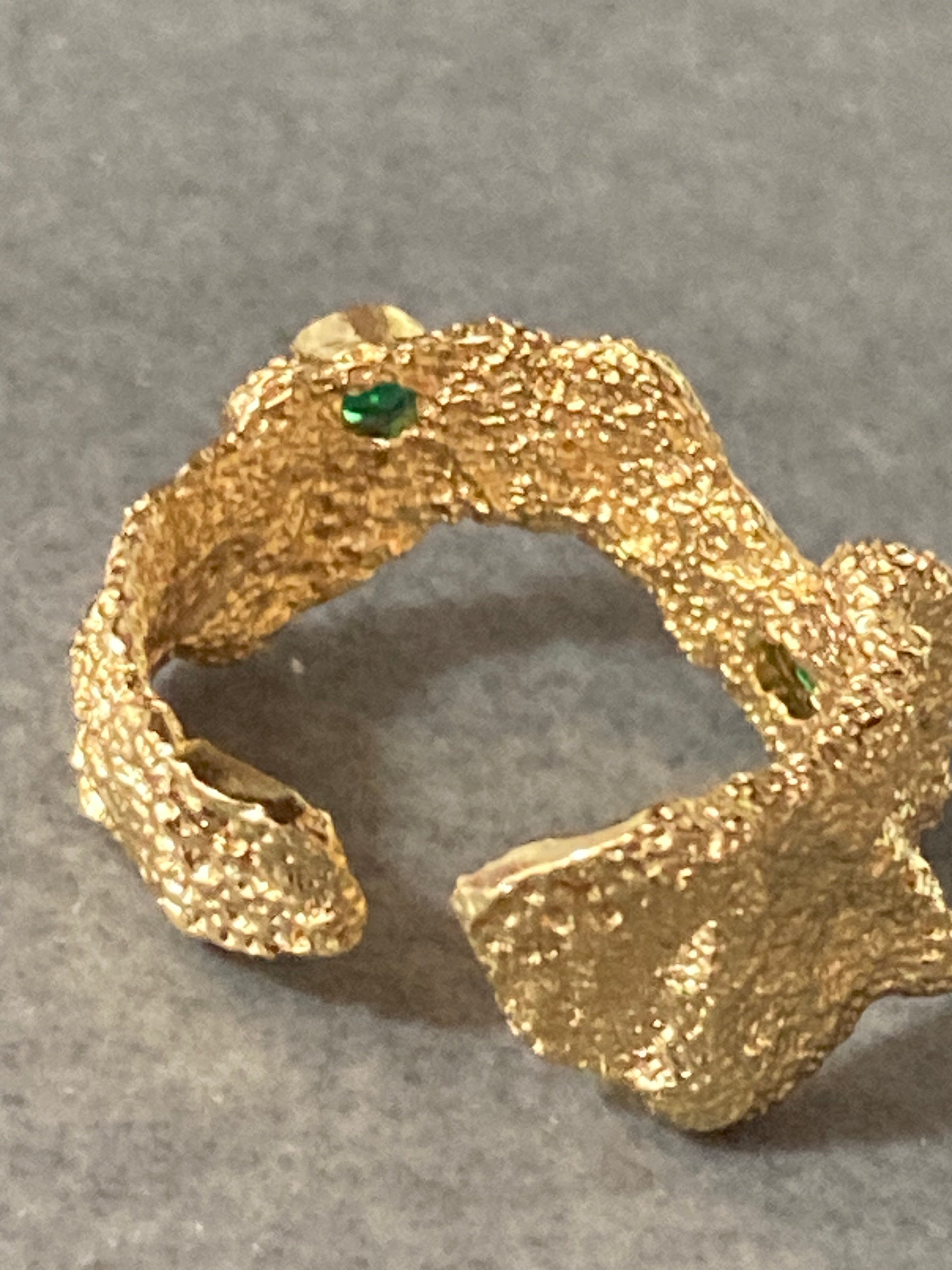 Modernist gold tone bark nugget dress ring with green stones