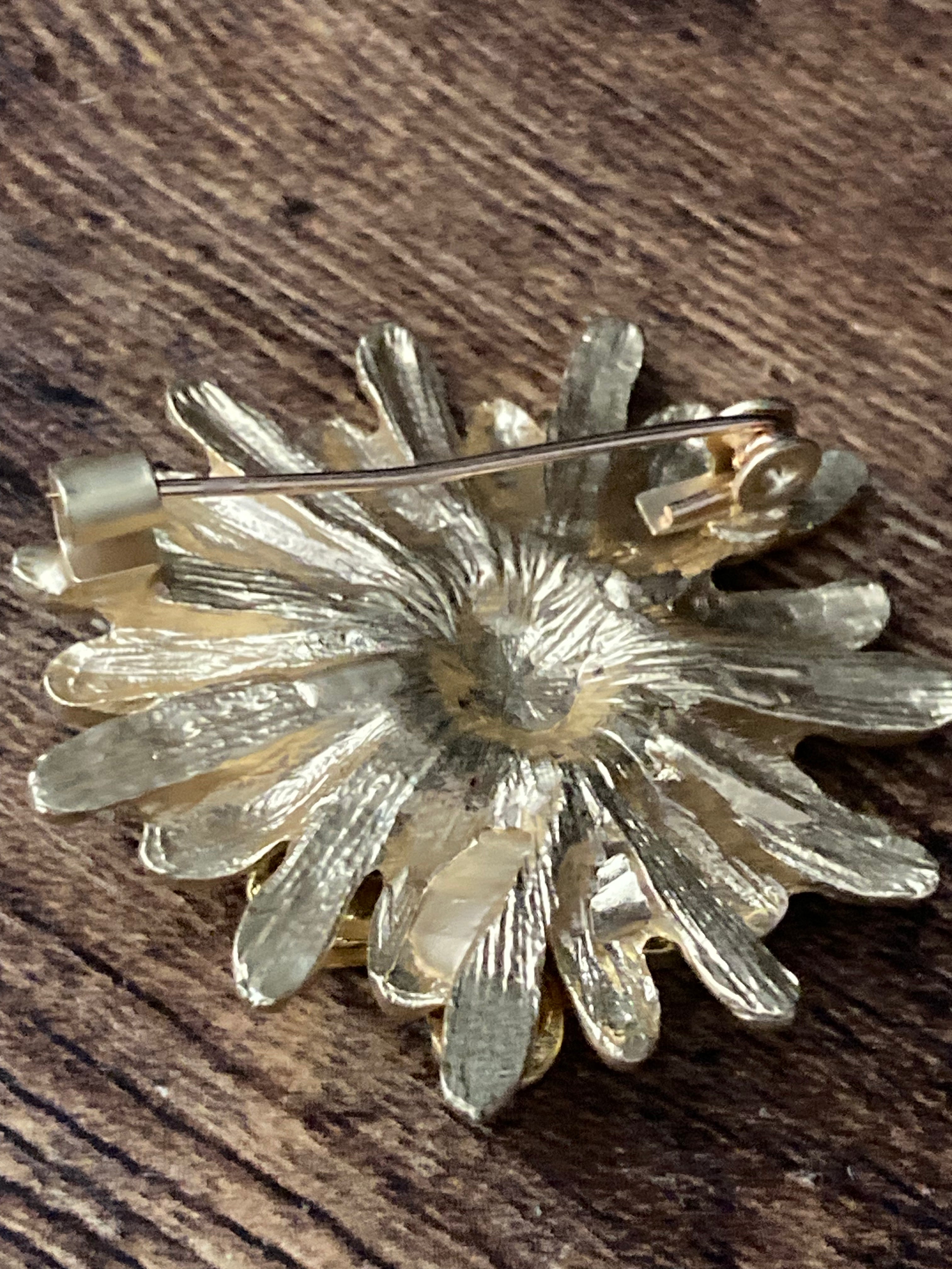 Gold bee collecting nectar flower brooch