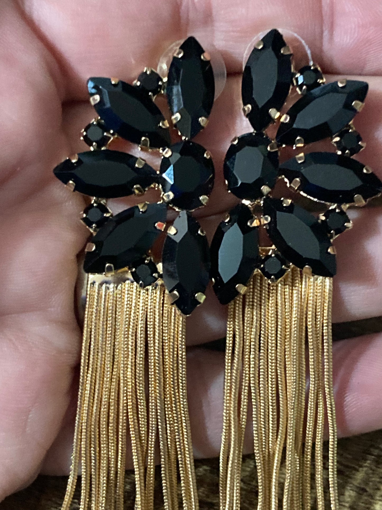 Black diamanté long gold tassel earrings