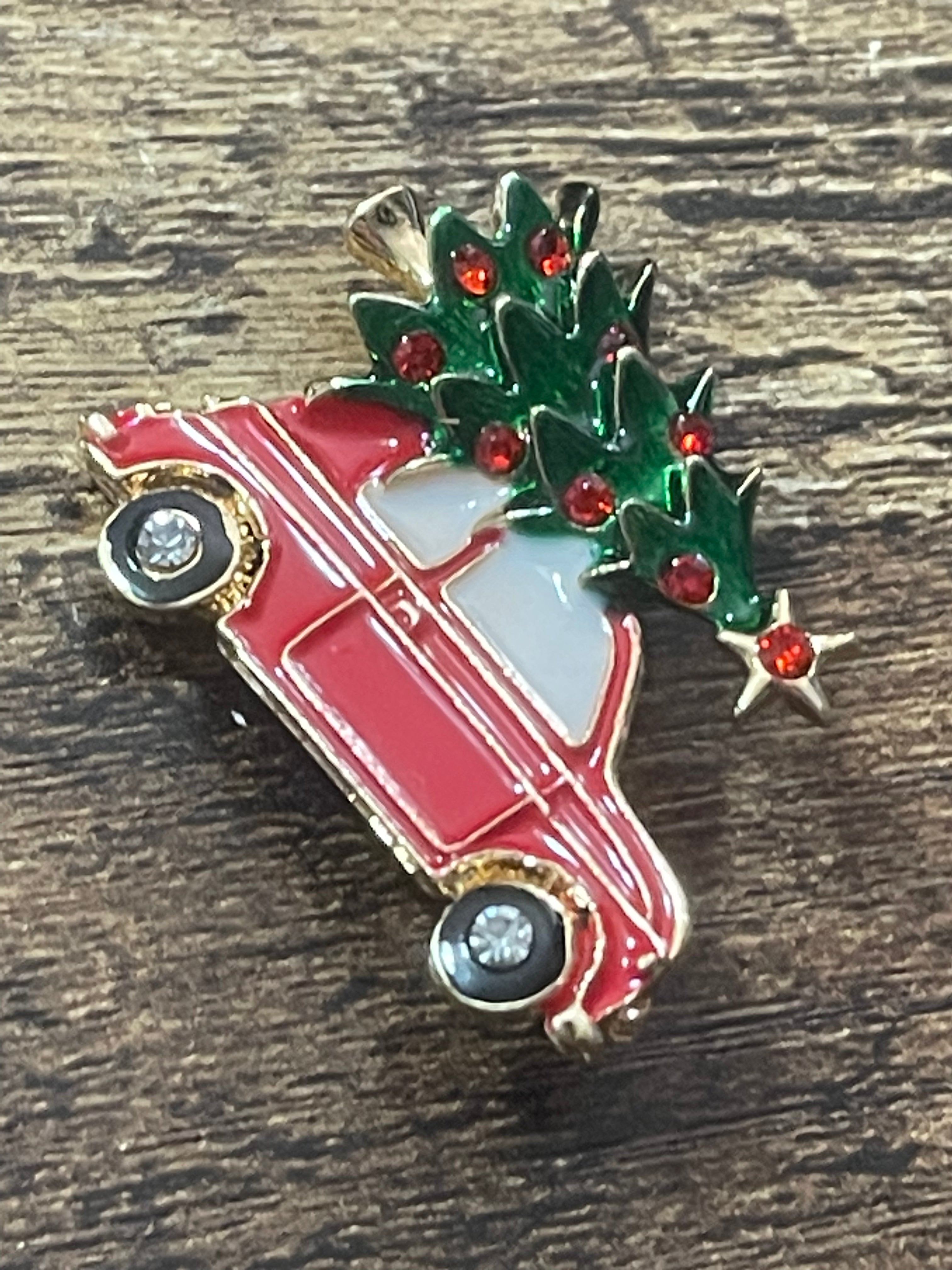 Driving home for Christmas tree and car brooch