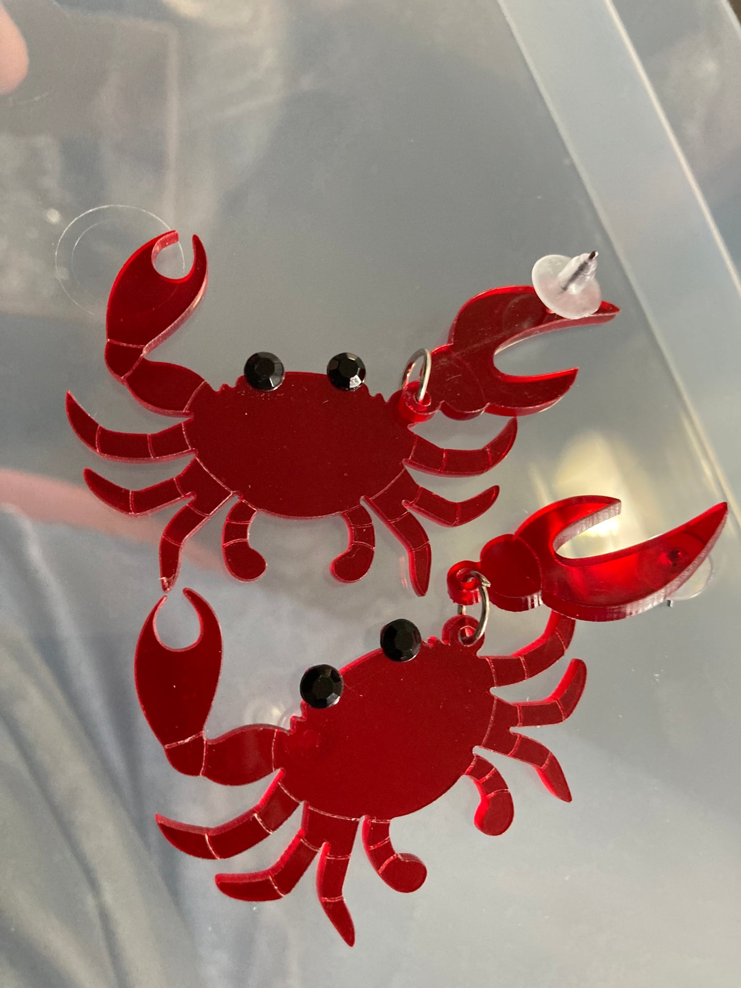 Large red acrylic crab earrings