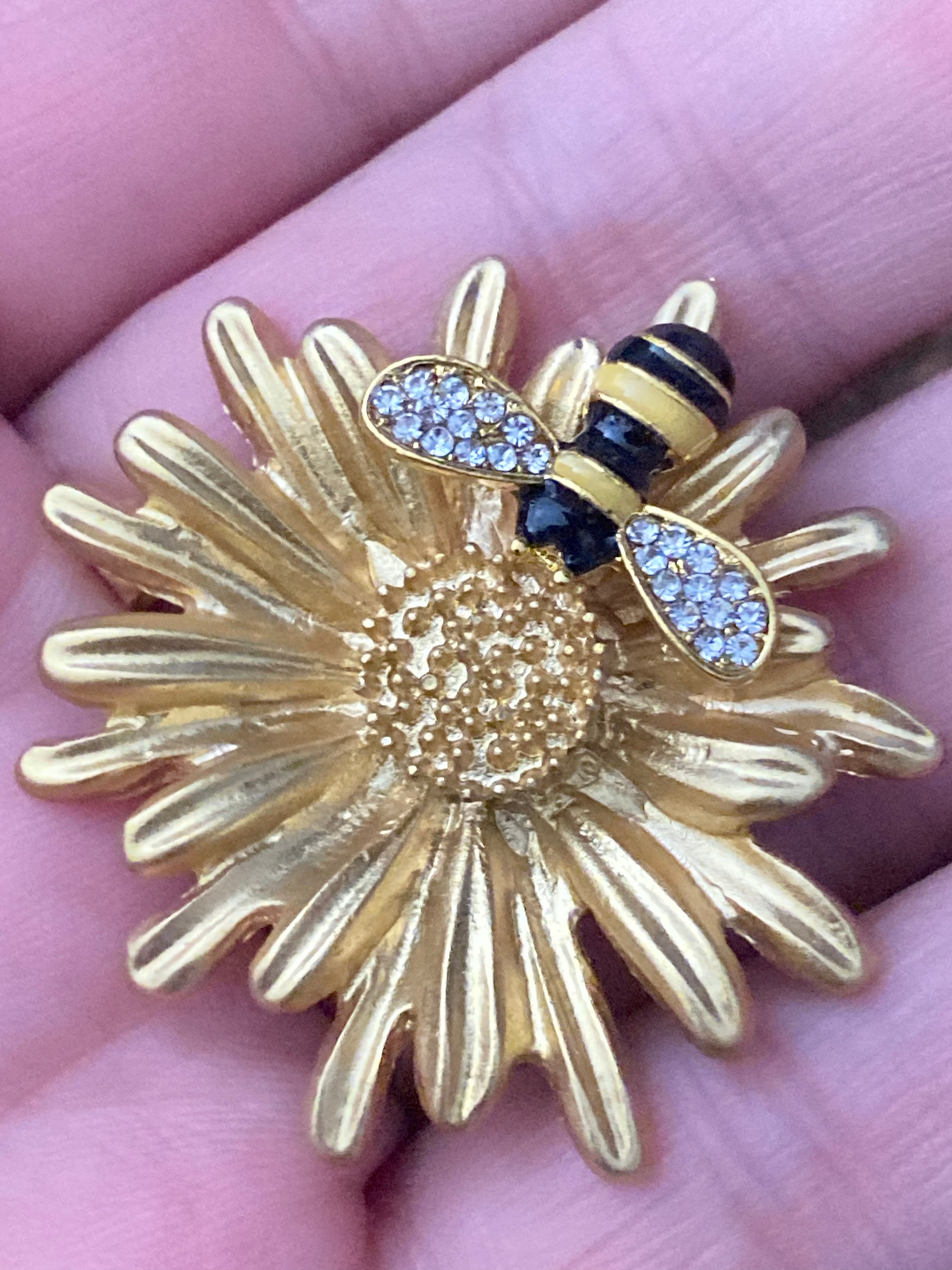 Gold bee collecting nectar flower brooch