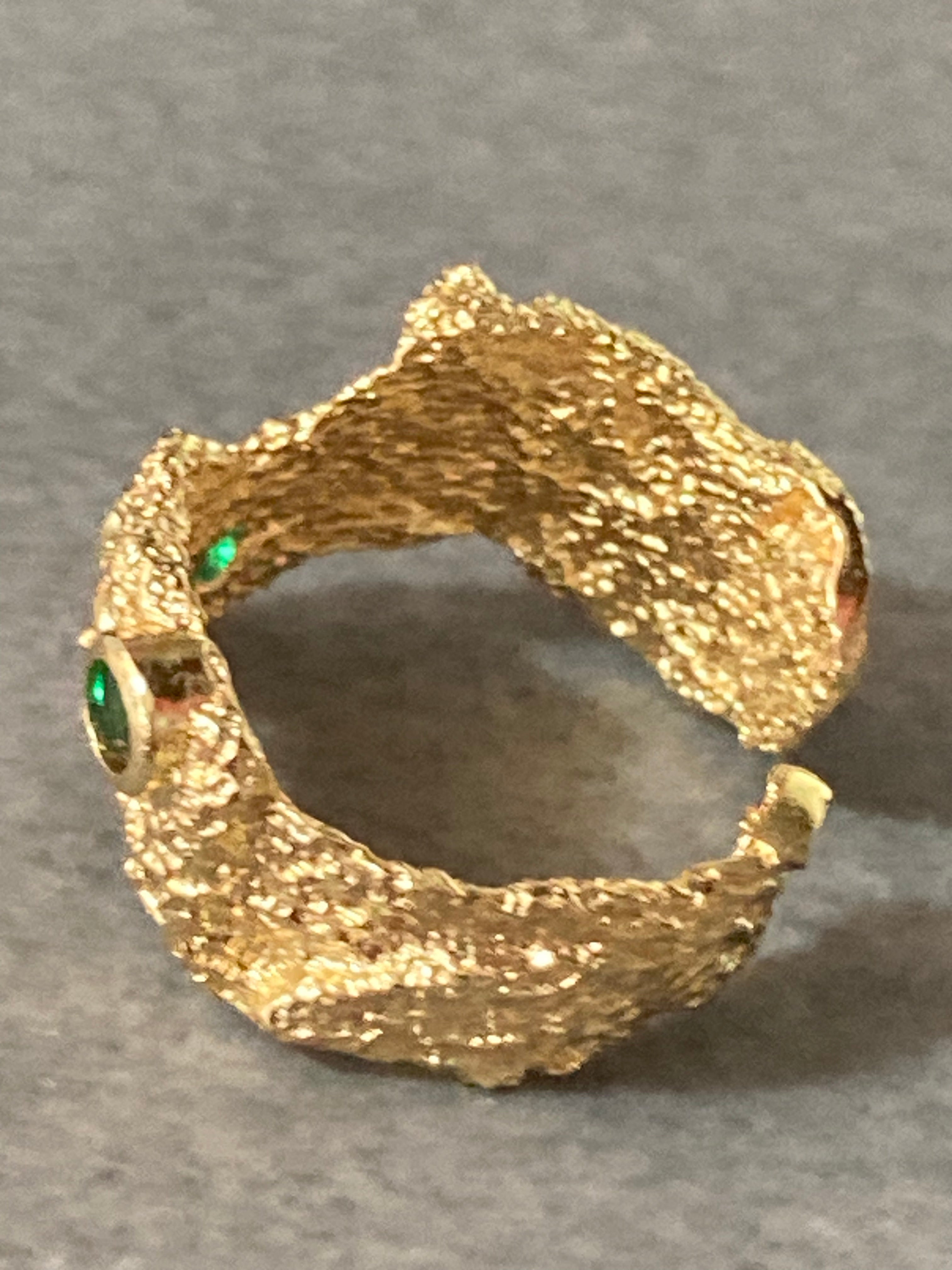 Modernist gold tone bark nugget dress ring with green stones