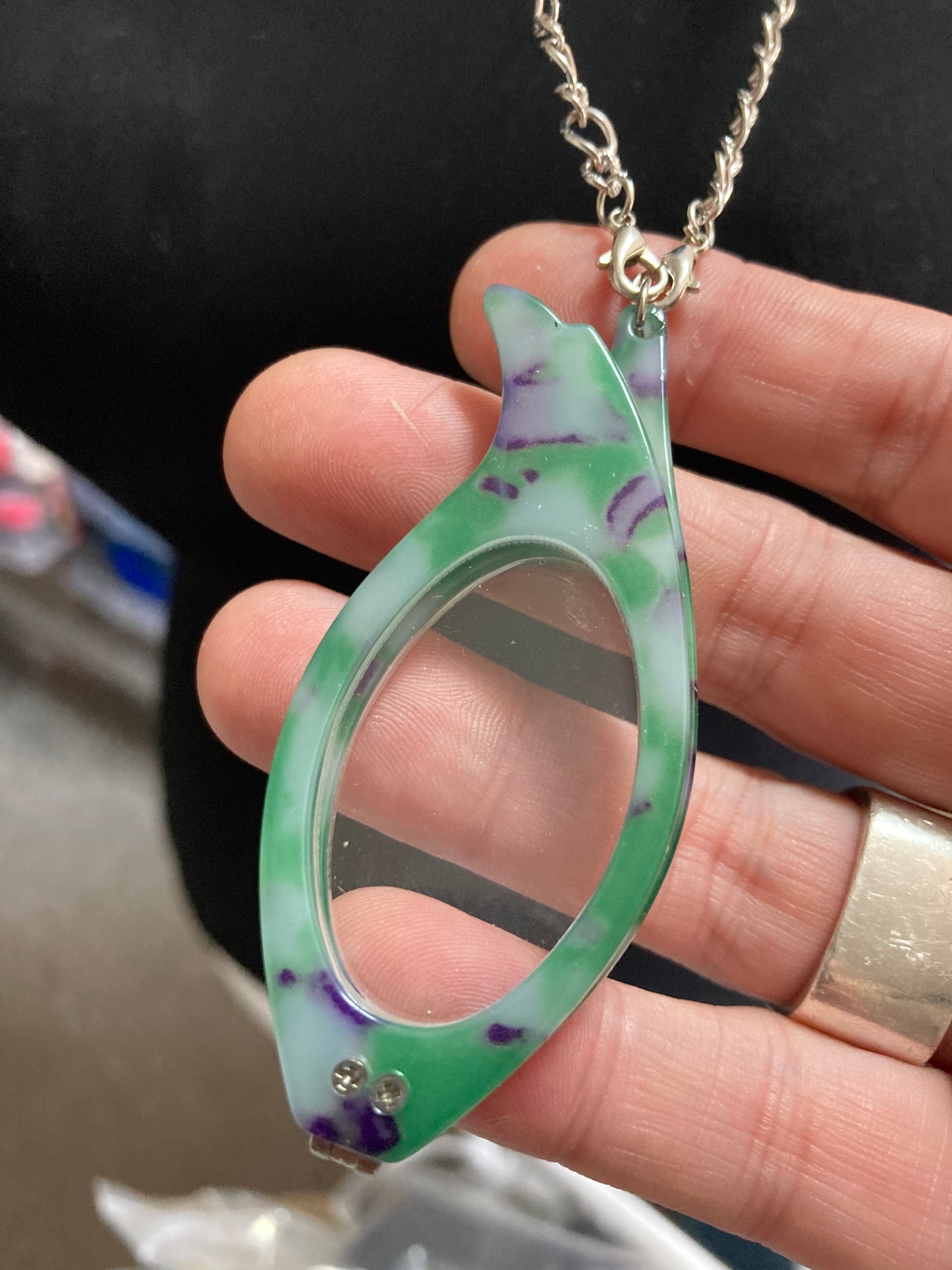 Folding green reading glasses on chain