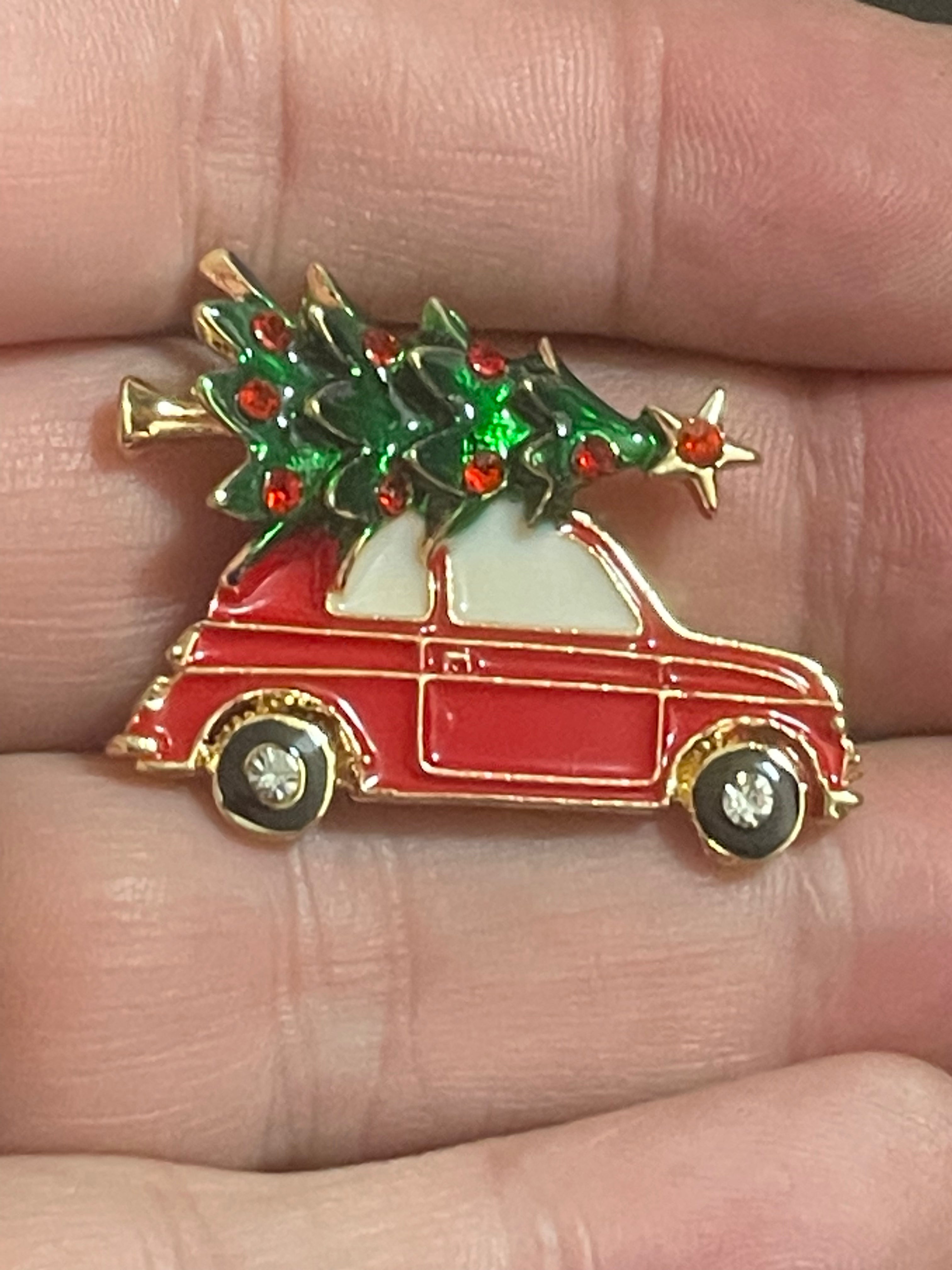 Driving home for Christmas tree and car brooch