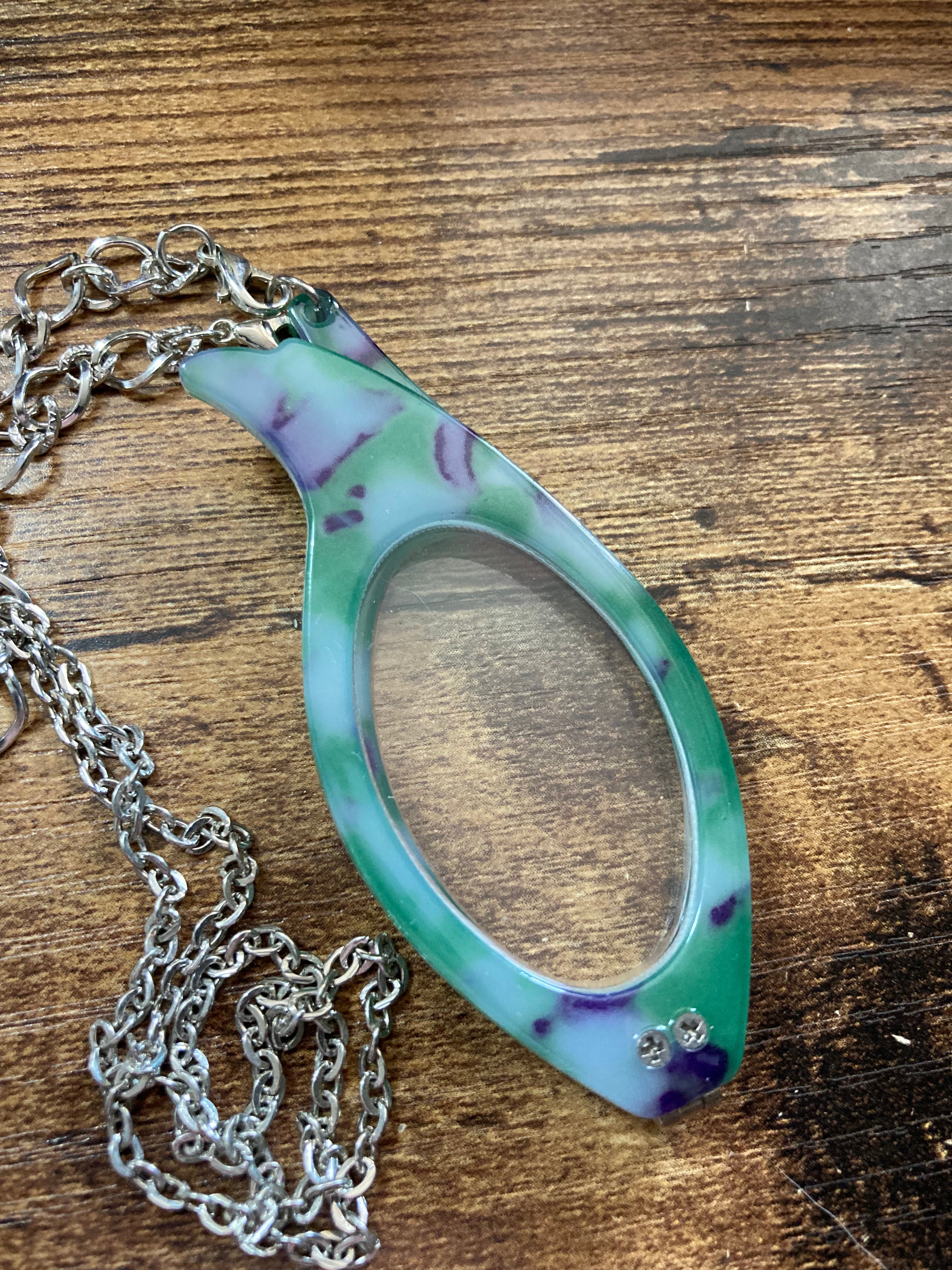 Folding green reading glasses on chain