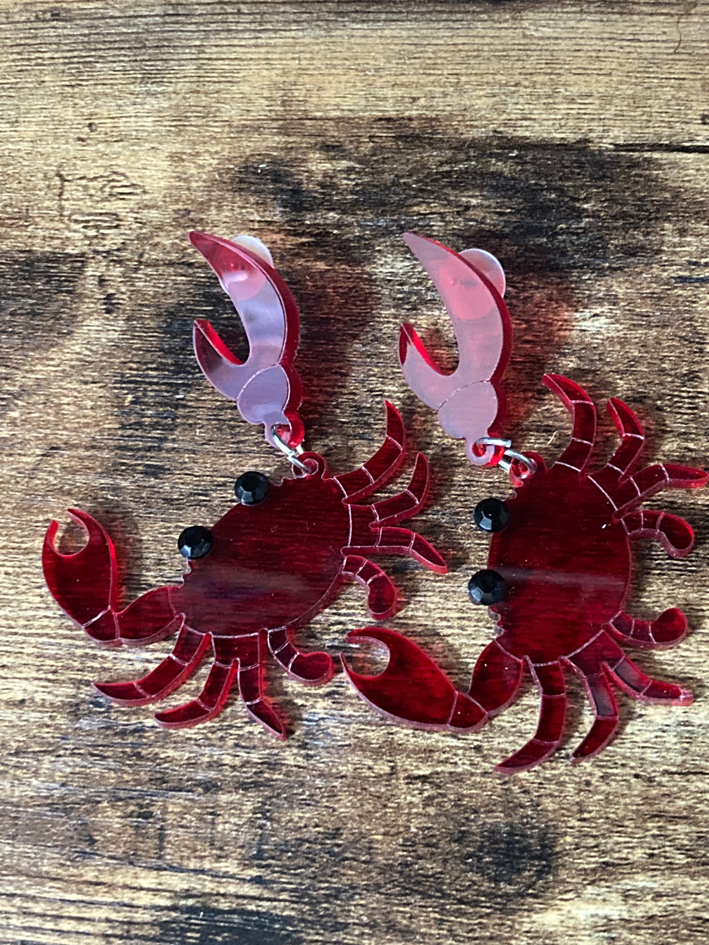 Large red acrylic crab earrings