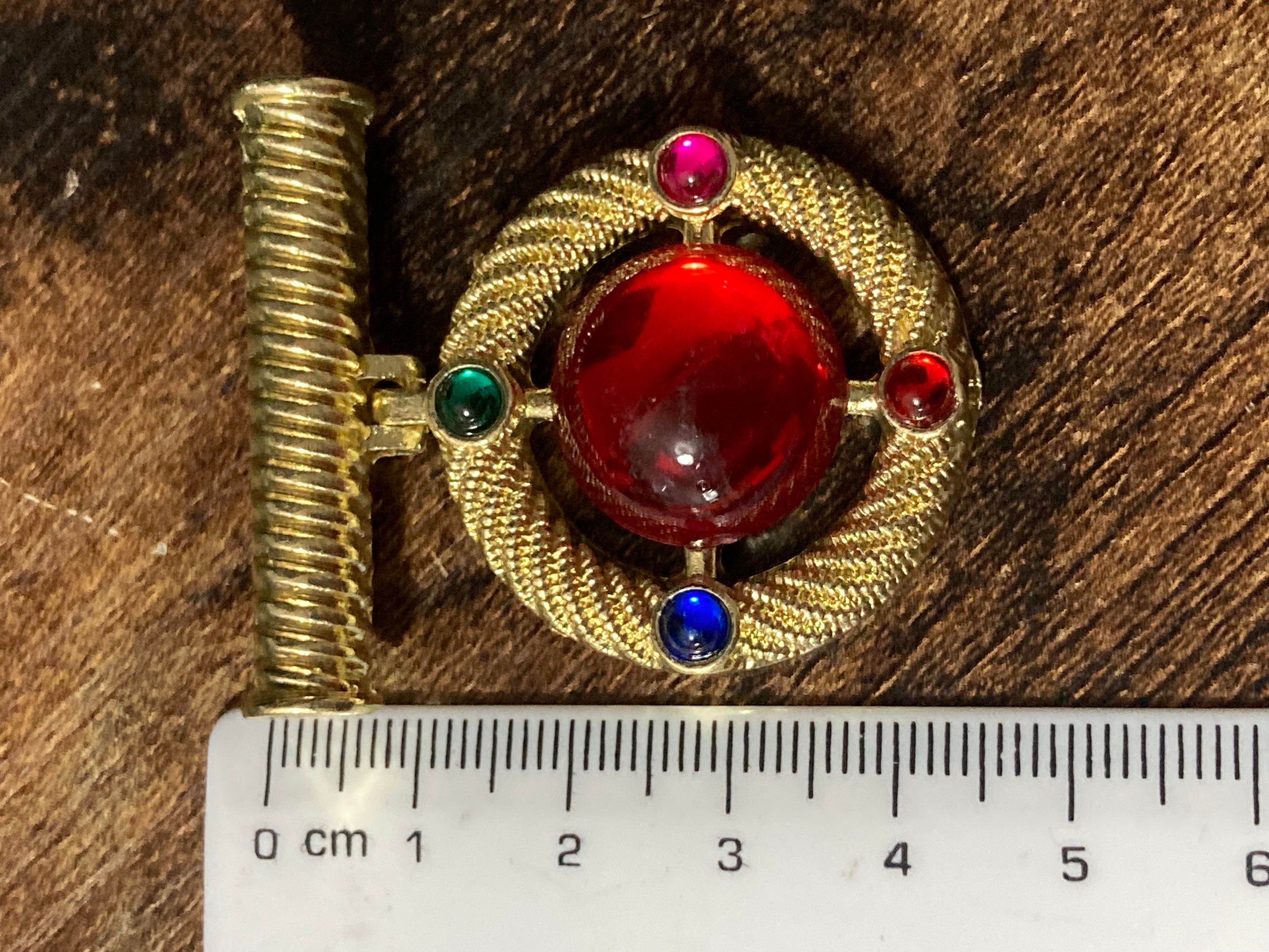 Gold medal ruby glass hanging brooch